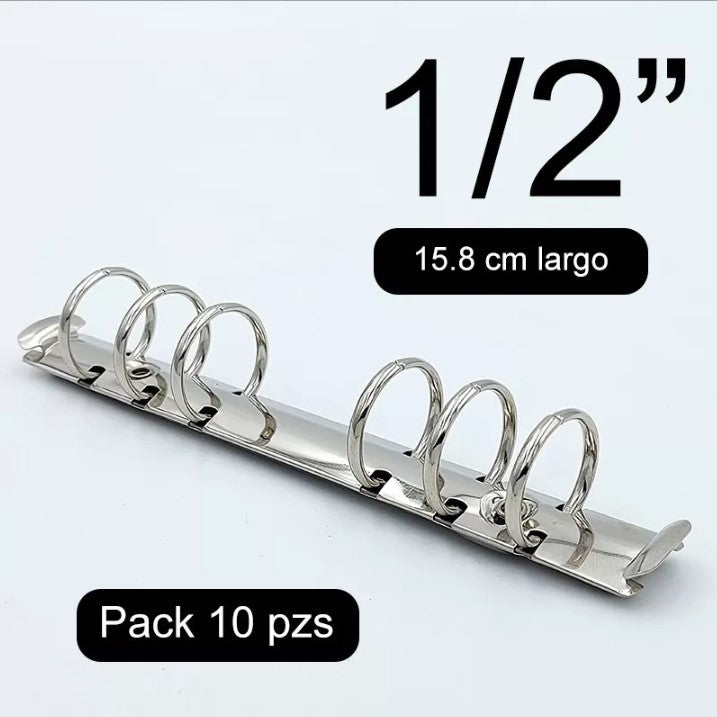 Mecanismo de media pulgada con seis argollas y palancas laterales, acabado níquel, ideal para carpetas, agendas y organizadores. Incluye remaches como obsequio. Mecanismo de media pulgada con seis argollas y palancas laterales, acabado níquel, ideal para carpetas, agendas y organizadores. Incluye remaches como obsequio.